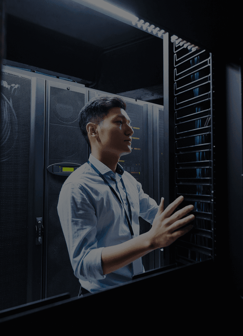 Man managing data center equipment