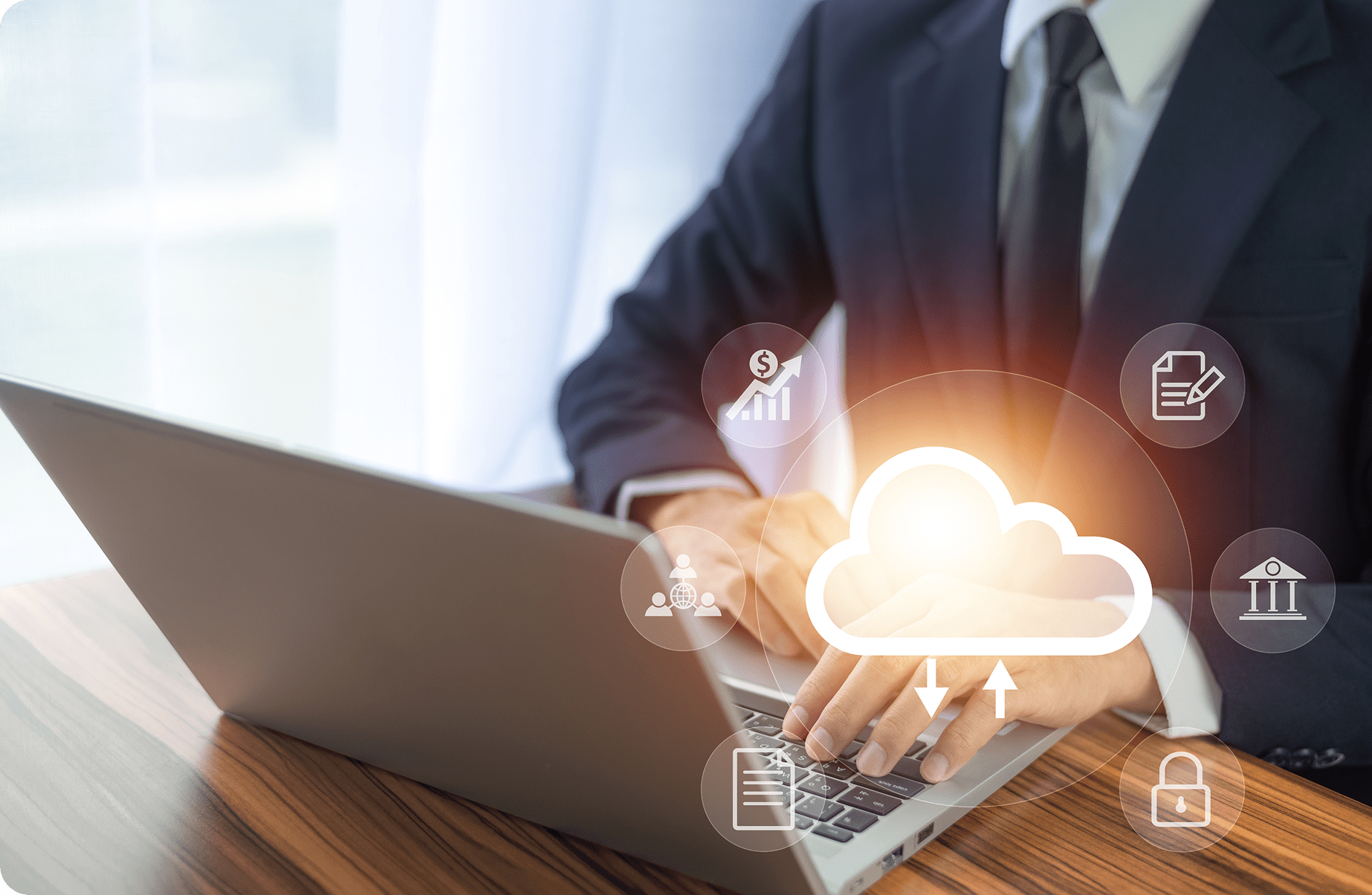 Man working on laptop with digital cloud.
